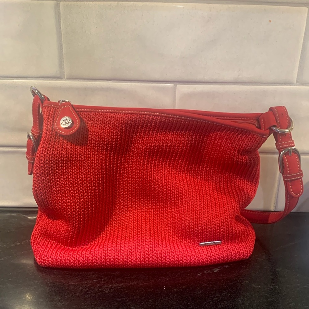 The SAK red crocheted shoulder bag